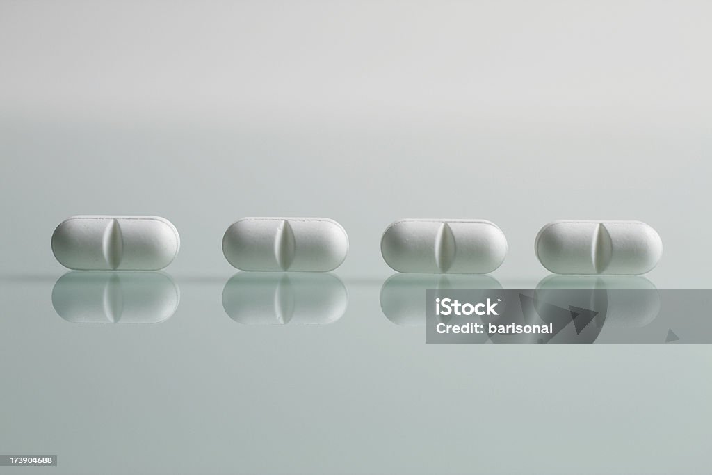 Cuatro comprimidos - Foto de stock de Amistad libre de derechos