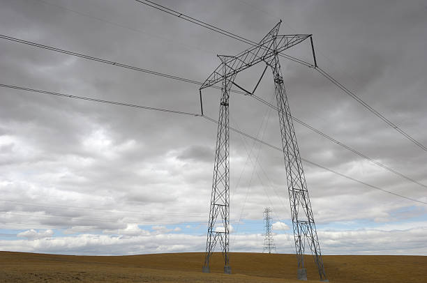 istock Pylons and Power Lines on Cloudy Day 173904817