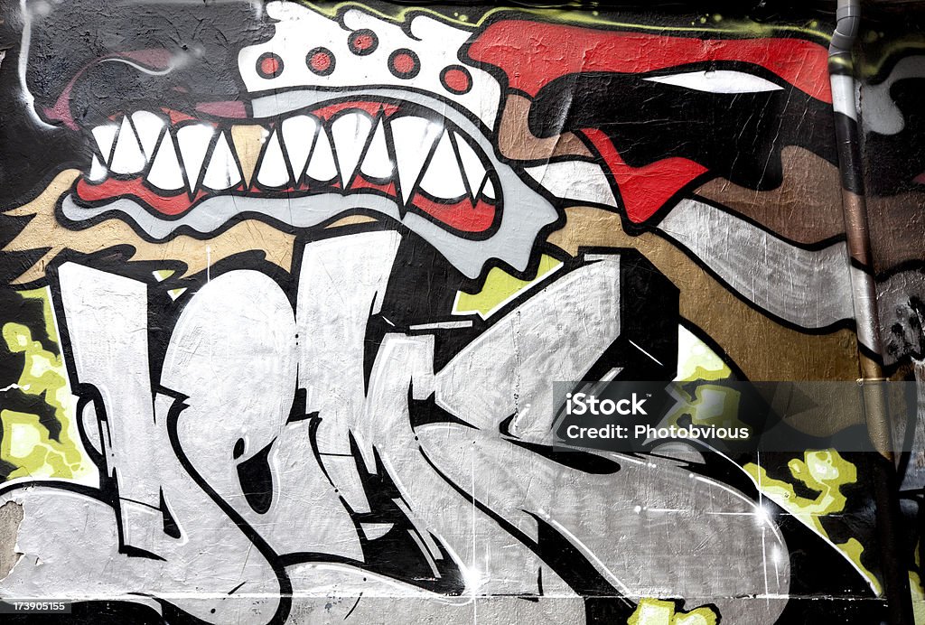 Wild graffiti. Vandalism art. Series Dramatic graffiti. Graffiti Stock Photo