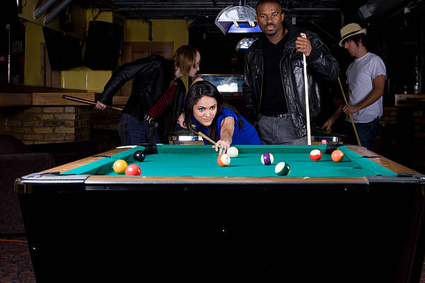 istock Friends Play Pool At A Bar 173905470