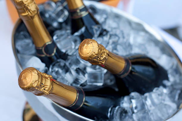 Bottles of Champagne in cooler stock photo