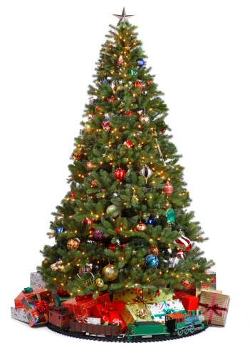 Christmas Tree decorated on white background. Presents and train underneath.