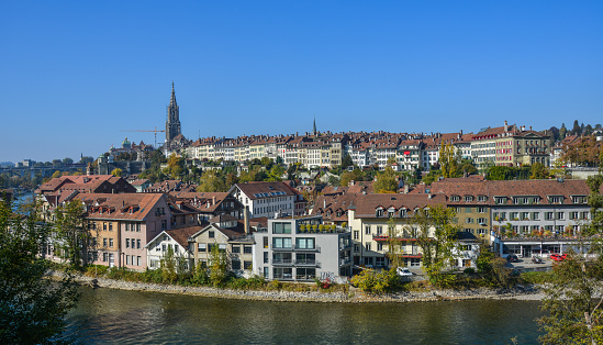 Bern, Switzerland - Oct 22, 2018. View of the old city center and stone bridge over river Aare in Bern, Switzerland.