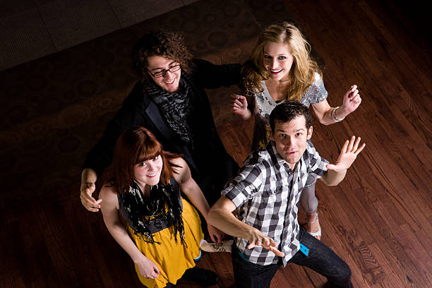 istock Overhead View of Four Friends Dancing 173908256