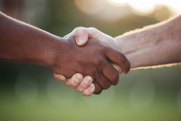 istock Shaking hands, partnership and trust, support and solidarity with congratulations or thank you. Introduction, success and team of people with handshake, welcome in community and collaboration meeting 1739086713