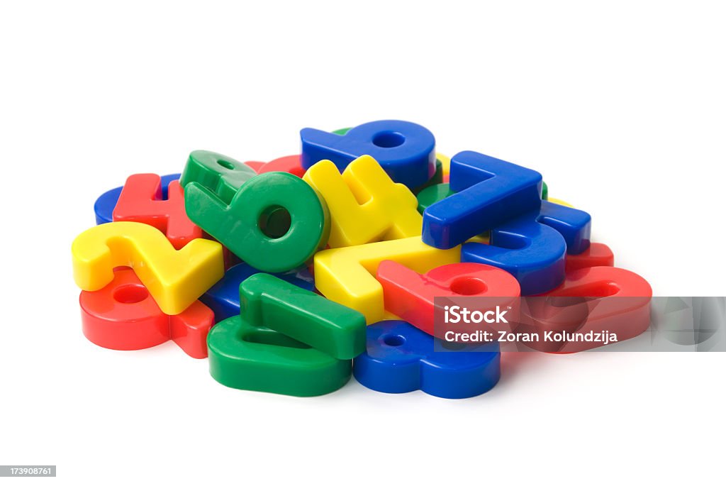 Heap of numbers Heap of toy magnetic numbers isolated on white. More related images in Zocha`s objects Number Stock Photo