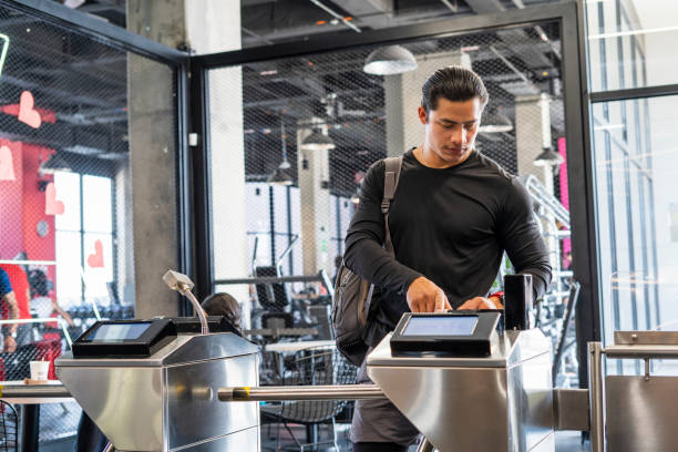 Man signing up to enter the gym