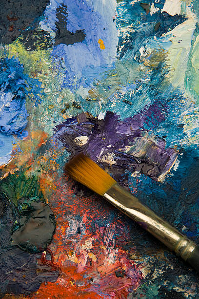 istock Artists acrylic paint palette close up semi abstract background 173909143