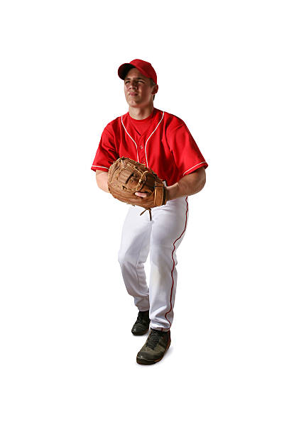 Baseball Player with Clipping Path Baseball player alert and ready to make a play. Nice dark shadows/contrast for drama and impact. Clipping path included. Shallow DOF with focus on glove. high school baseball stock pictures, royalty-free photos & images