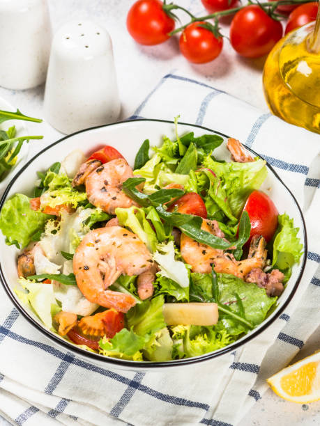 istock Seafood salad with leaves and vegetables. 1739097122