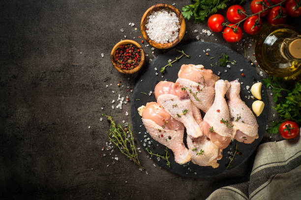 istock Chicken drumsticks with ingredients for cooking. 1739097779