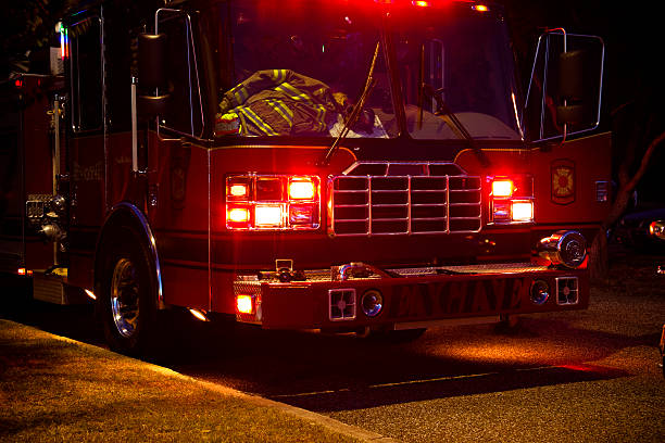 istock Firetruck in action at night 173910344