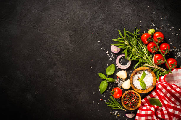 istock Food cooking background at black top view. 1739105123