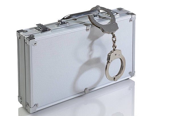 istock Metal Briefcase With Handcuffs 173911509