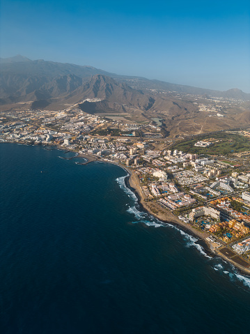 beautiful blue ocean water and luxury beach, hotels, resort of Tenerife, Canary island. High quality aerial view photo