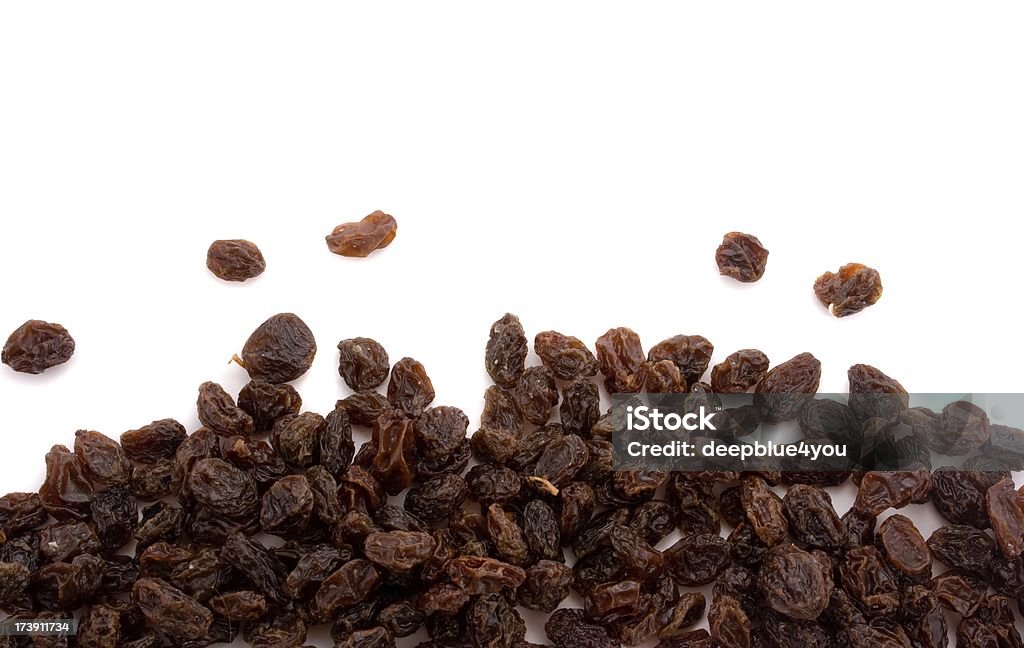 Isolé aux raisins secs - Photo de Fond blanc libre de droits