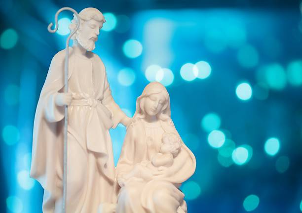 Closeup of Statue of Our lady virgin Mary with Child Jesus in catholic church, Thailand. selective focus.