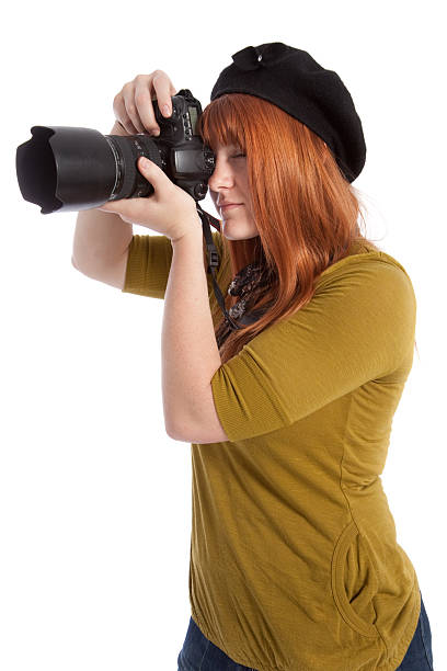 istock Female Photographer with Digital SLR Camera Isolated on White Background 173912308
