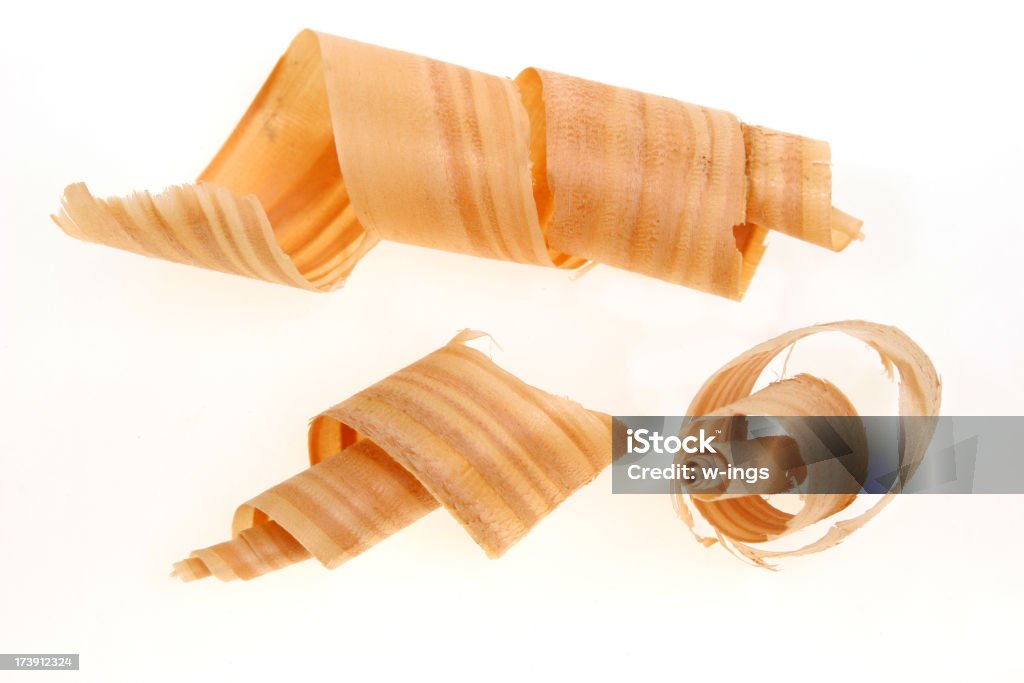 three wood shavings wood curls on white background Wood Chip Stock Photo