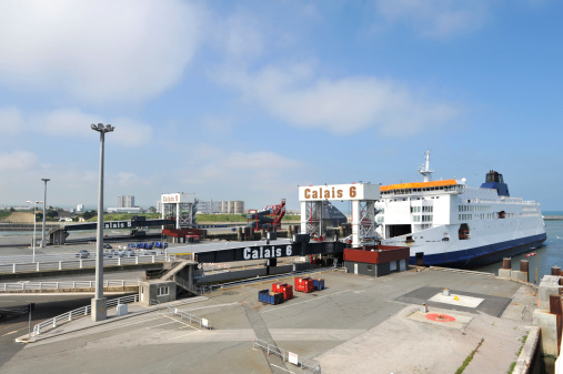 Cross channel passenger and car ferry moored and loading at the Port of Calais in France.