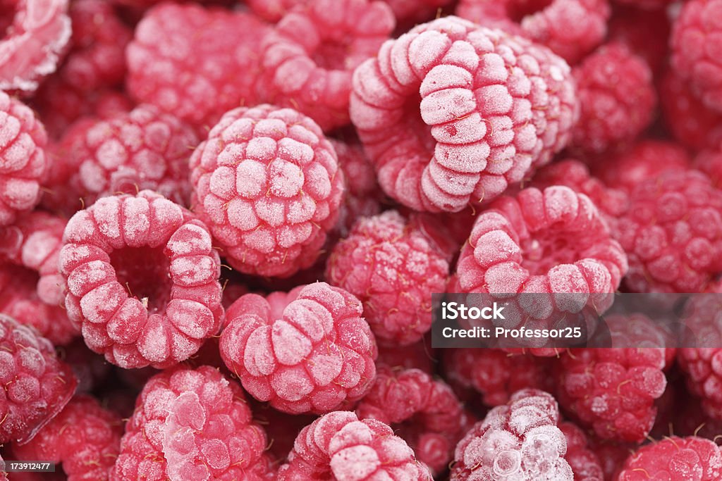 Congelarse raspberries primer plano - Foto de stock de Helado - Condición libre de derechos