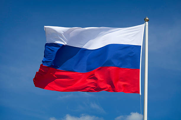 Russian flag waving in the wind stock photo