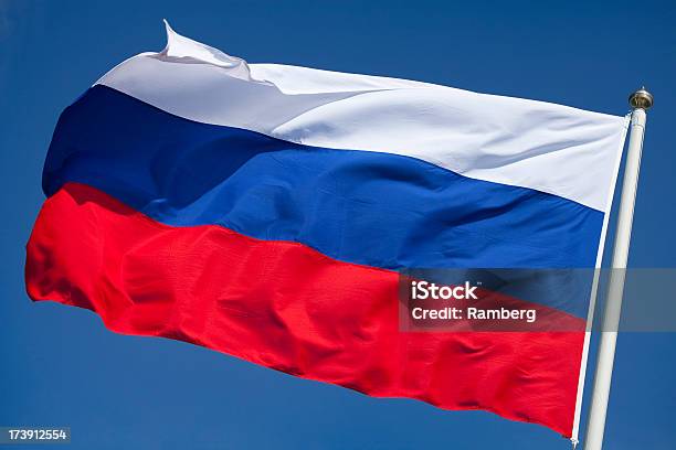 Russian Flag Flying Against Clear Blue Sky Stock Photo - Download Image Now - Russian Flag, Blue, Concepts