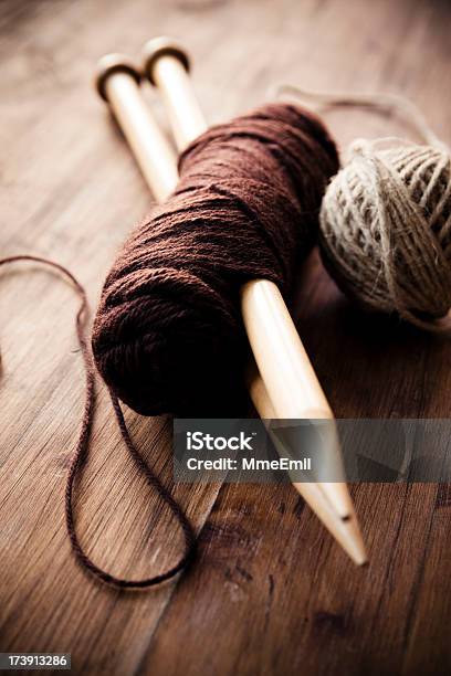 Extra Large Knitting Needles Piercing A Skein Of Brown Wool Stock Photo -  Download Image Now - iStock