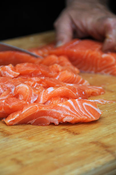 istock Fresh salmon fish on wooden cooking desk 173914044