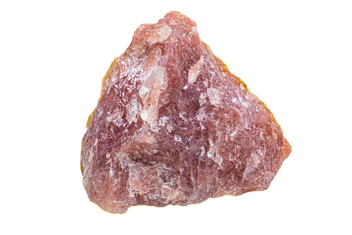 Macro raw chunk of pink strawberry quartz crystal, unpolished pink aventurine stone isolated on a white background surface