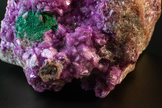 istock Cobalto calcite with malachite crystal macro on a black surface 1739146034