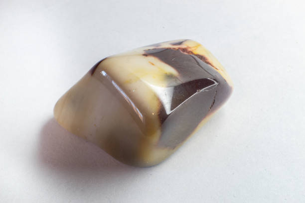istock Macro photography of Mookaite jasper on white surface. Chocolate like crystal. 1739146143