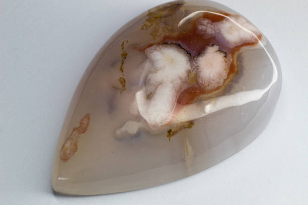 istock Flower dendritic agate chalcedony cabochon gem on white background macro 1739146251