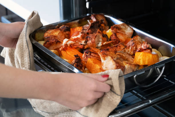 istock turkey pieces cooked in the oven with pumpkin and potatoes 1739149298