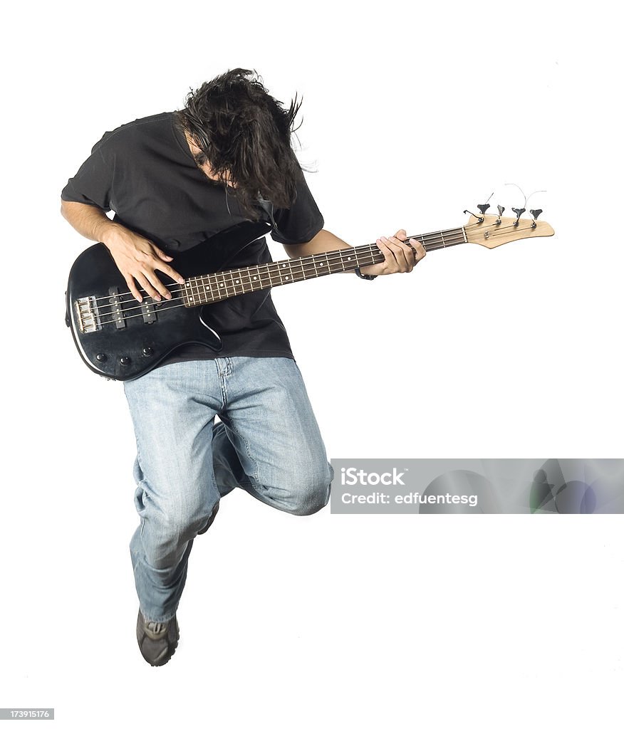 Rocker A guy rocking out with a black bass guitar and black shirt. Alternative Rock Stock Photo