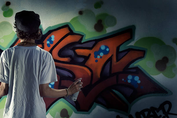 istock Graffiti Artist with Spray Paint Hz 173915411