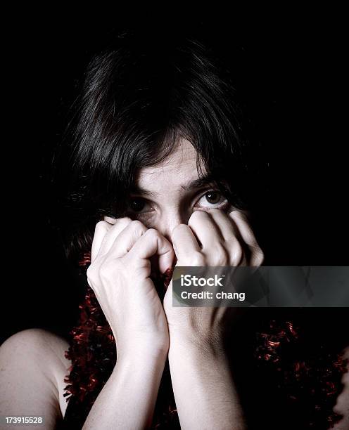 Fragile Women Stock Photo - Download Image Now - Hiding, Latin American and Hispanic Ethnicity, One Woman Only