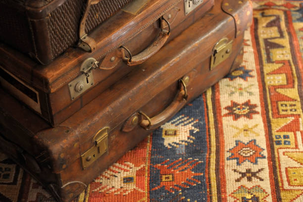 istock Old suitcases on an oriental kilim 173915707