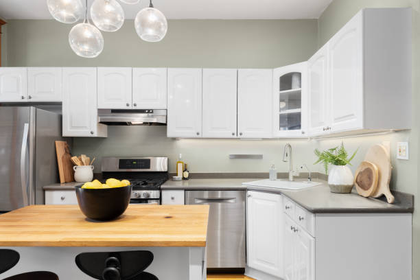 istock A kitchen detail with white cabinets and green walls. 1739158063