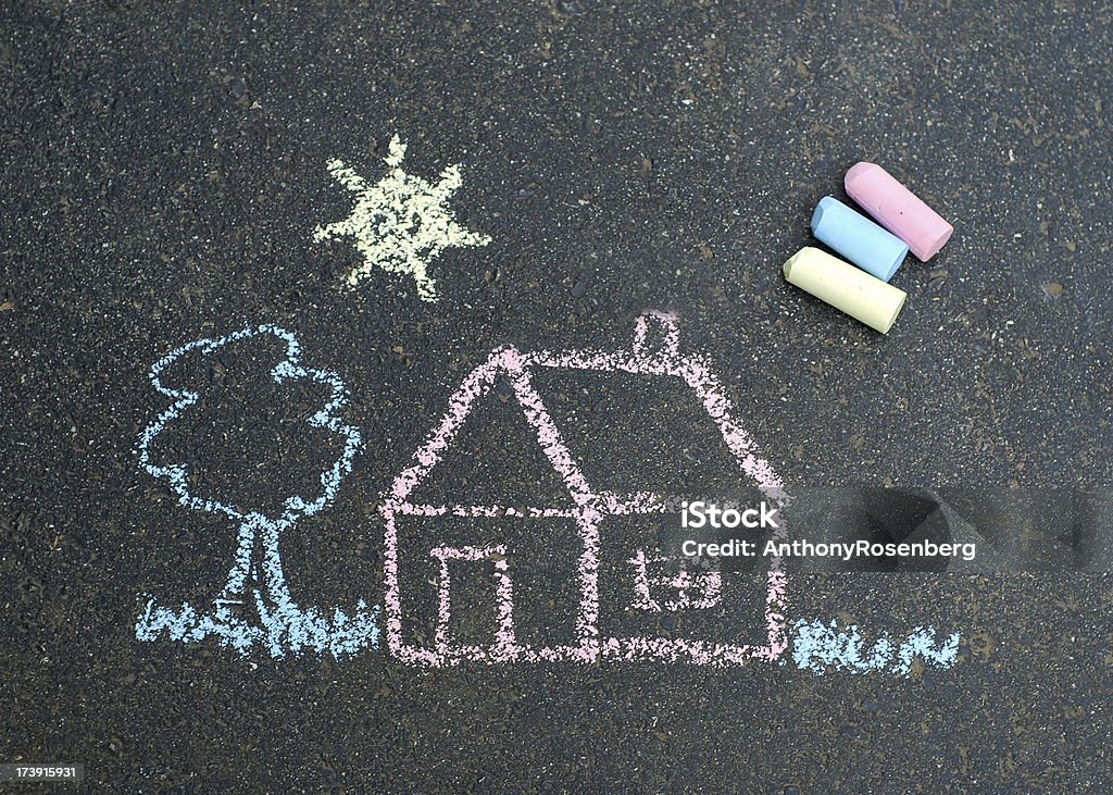 Chalk drawing A child's sidewalk chalk drawing on the pavement.   Chalk - Art Equipment Stock Photo