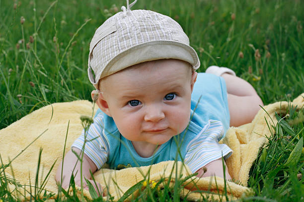 istock baby in a picnic field 173916317