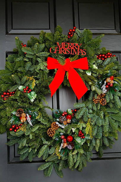 istock Christmas Wreath on Black Door 173916820