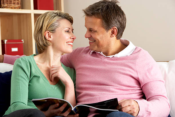 istock Middle Aged Couple Relaxing At Home 173917235