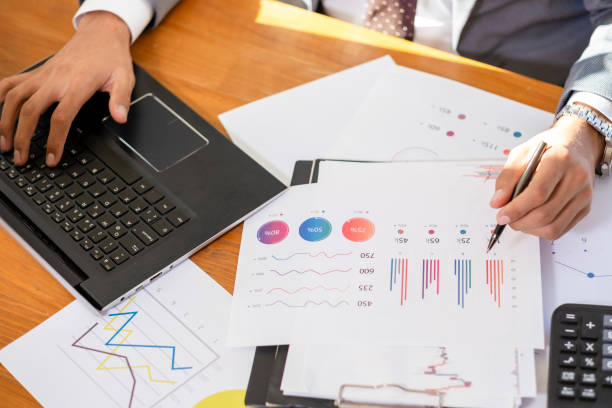 istock Unrecognizable Businessman Sitting at the Office Analyzing Financial Reports 1739176677