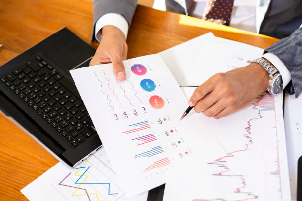 istock Unrecognizable Businessman Sitting at the Office Analyzing Financial Reports 1739176678
