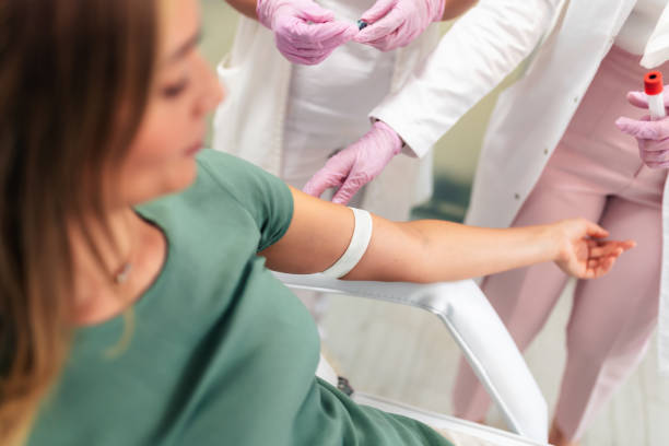 istock Nurse takes blood from the patient's hand 1739179466