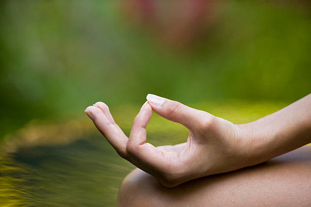 istock Hand of woman meditating 173918185