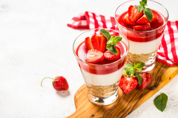 istock Cheesecake in the glasses with fresh strawberry. 1739192848