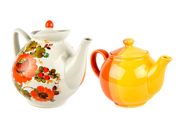 istock Two porcelain teapots isolated on a white . Collage. 1739197370