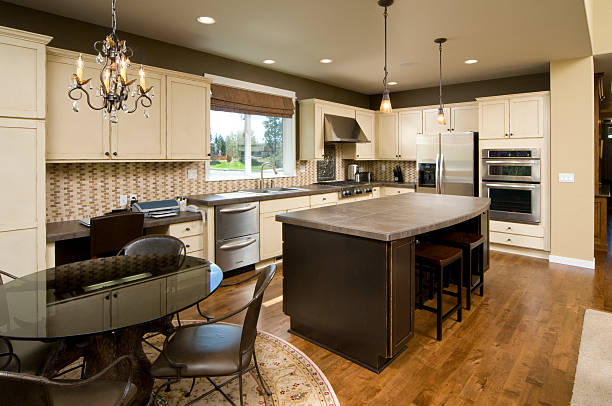 istock Modern kitchen with dark wood island. 173920047